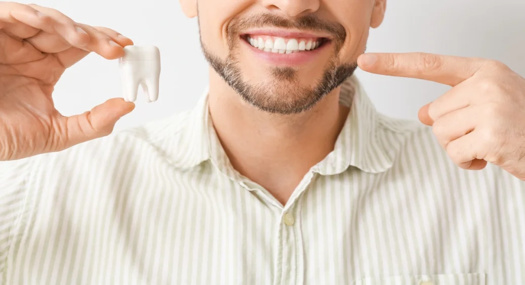 Sonhar com dente caindo: sinais, causas e como reagir