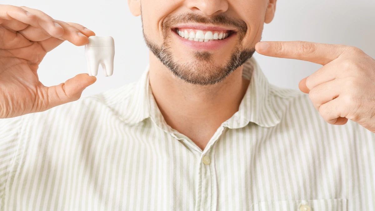 Sonhar com dente caindo: sinais, causas e como reagir